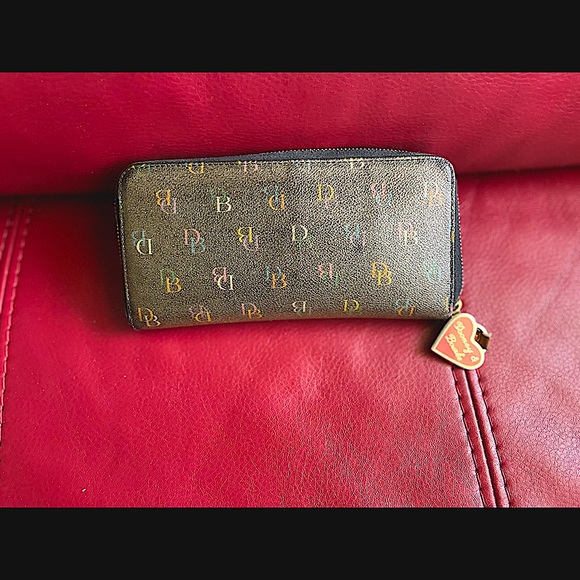Dooney & Bourke Handbags - D&B Wallet Well Loved!!!!